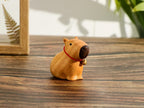 Capybara en bois sculpté à la main avec cloches, décoration de table kawaii