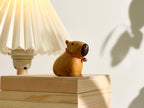 Capybara en bois sculpté à la main avec cloches, décoration de table kawaii